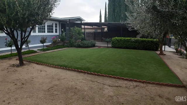 a view of a house with a garden