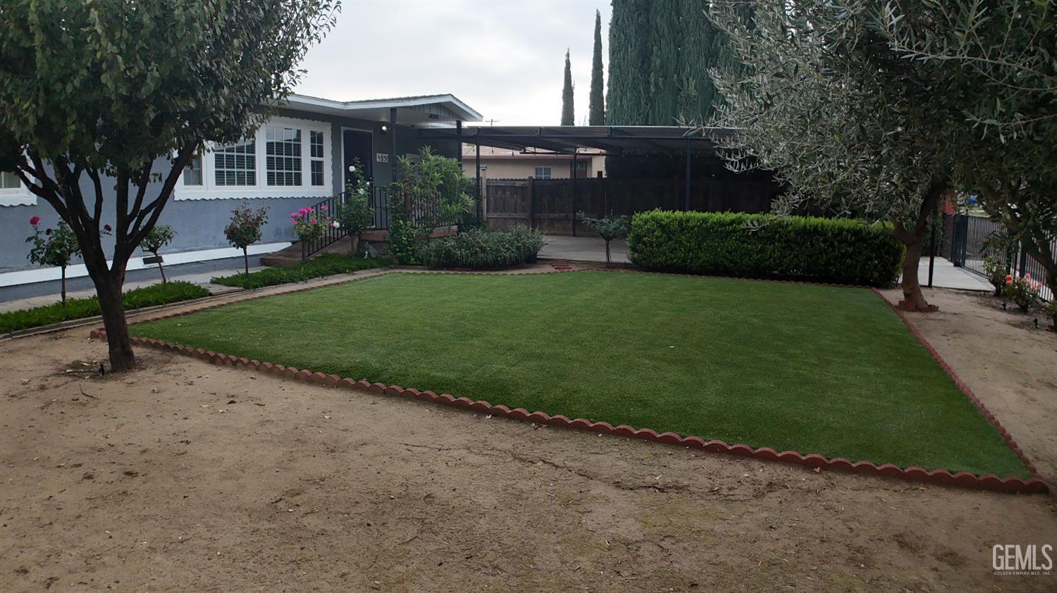 Undisclosed Address New Cuyama, CA 93254 - Photo 16 of 45 a view of a house with a garden