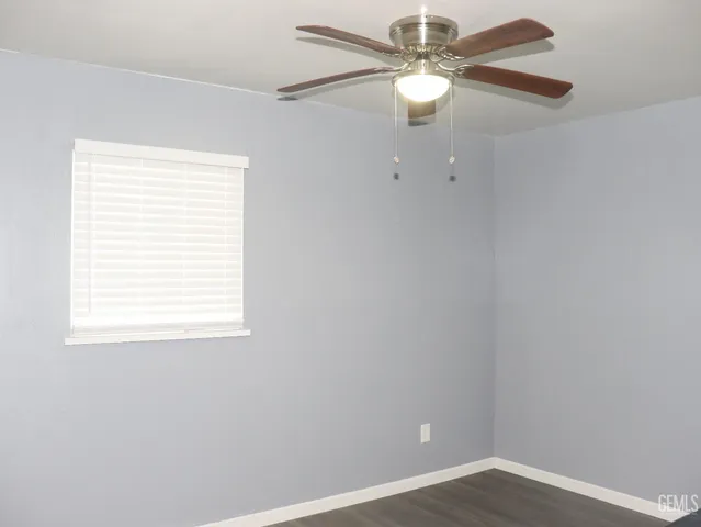 a view of a livingroom with wooden floor