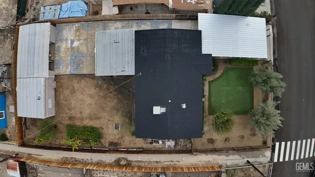 a view of a brick house with a street