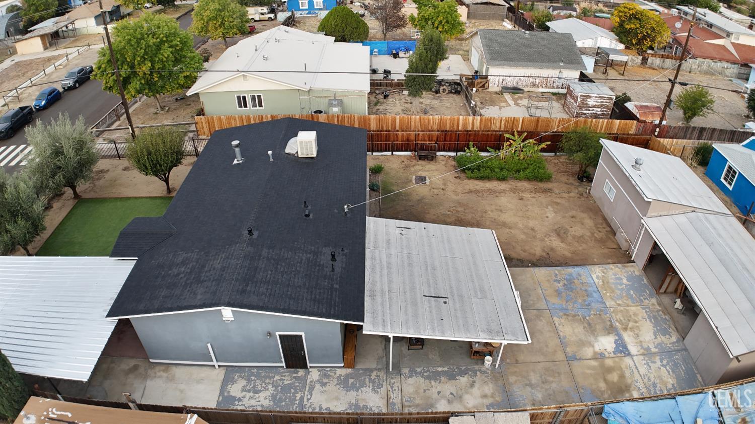 Undisclosed Address New Cuyama, CA 93254 - Photo 9 of 45 an aerial view of a house with a yard