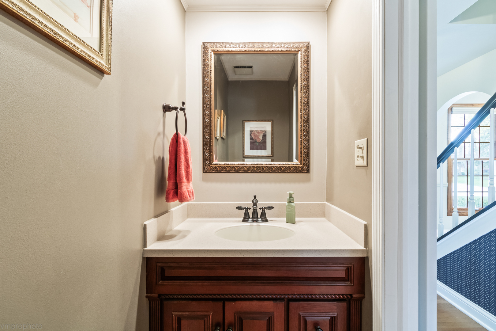 3963 Bordeaux Drive Hoffman Estates, IL 60192 - Photo 15 of 33 a bathroom with a sink and a mirror