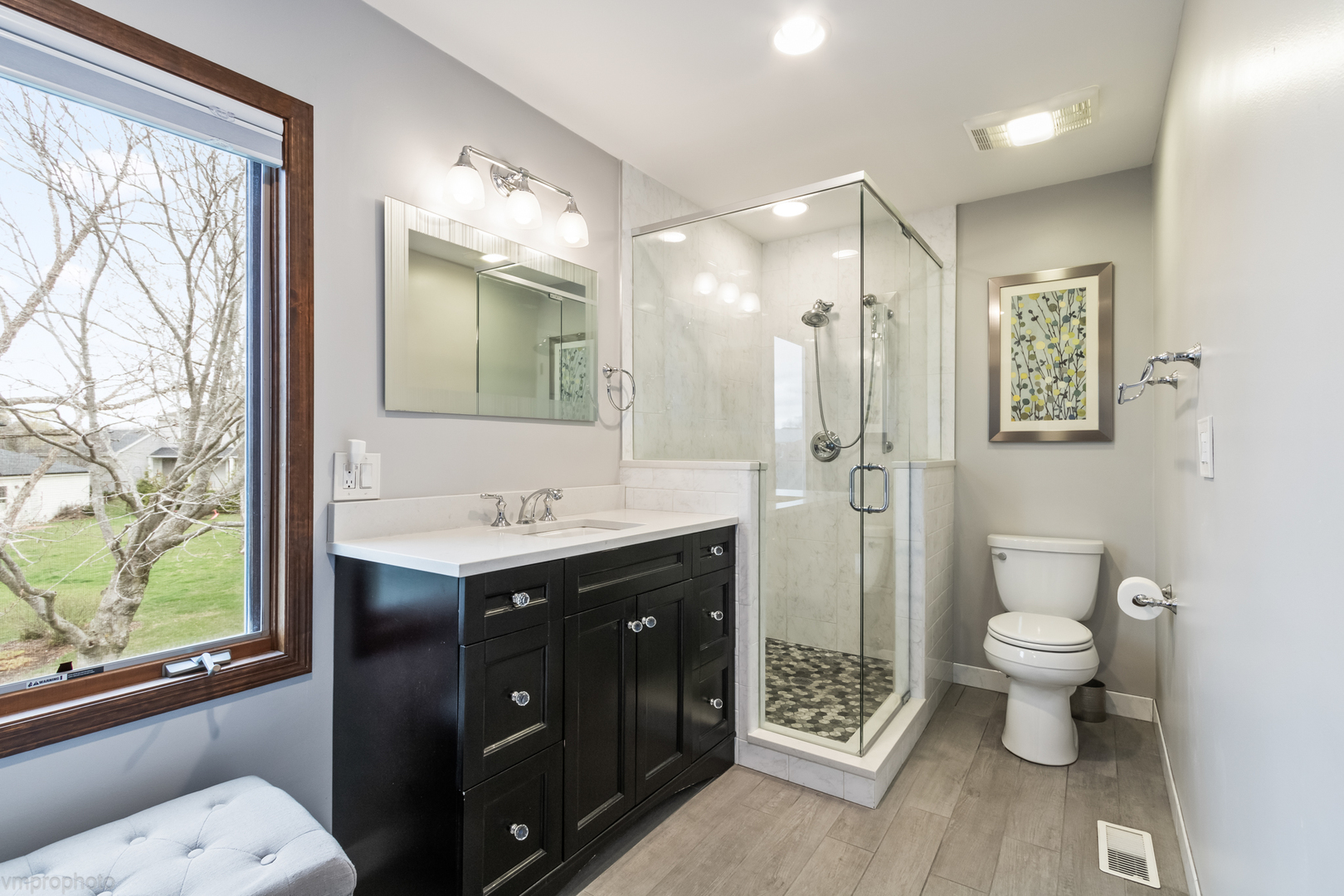 3963 Bordeaux Drive Hoffman Estates, IL 60192 - Photo 19 of 33 a bathroom with a sink toilet and shower