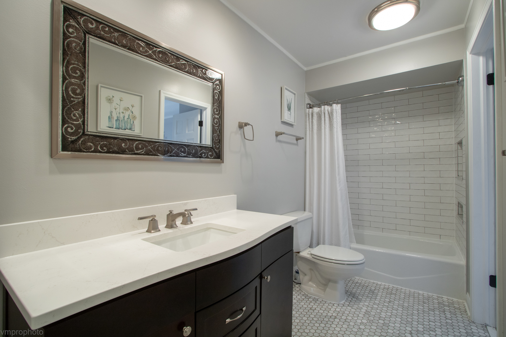 3963 Bordeaux Drive Hoffman Estates, IL 60192 - Photo 21 of 33 a bathroom with a sink a toilet and shower