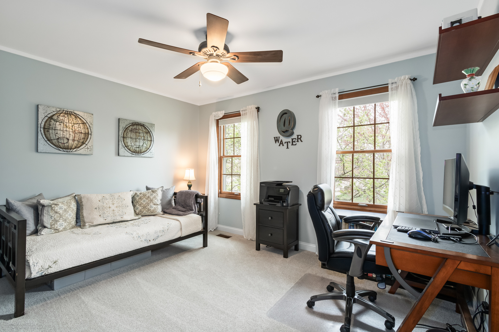 3963 Bordeaux Drive Hoffman Estates, IL 60192 - Photo 23 of 33 a living room with furniture and a window