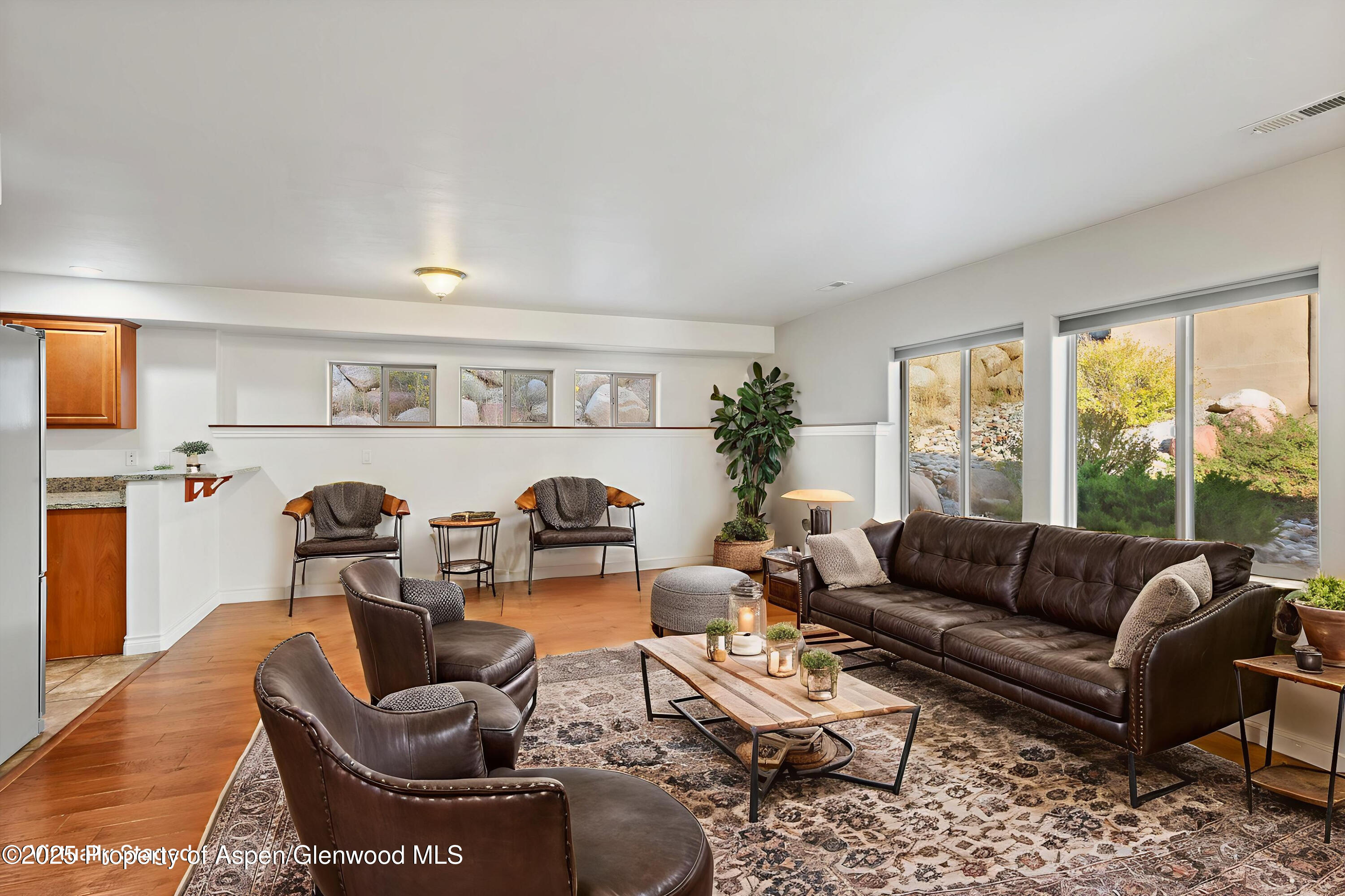 200 Castle Ridge Drive New Castle, CO 81647 - Photo 1 of 24 a living room with furniture and a large window