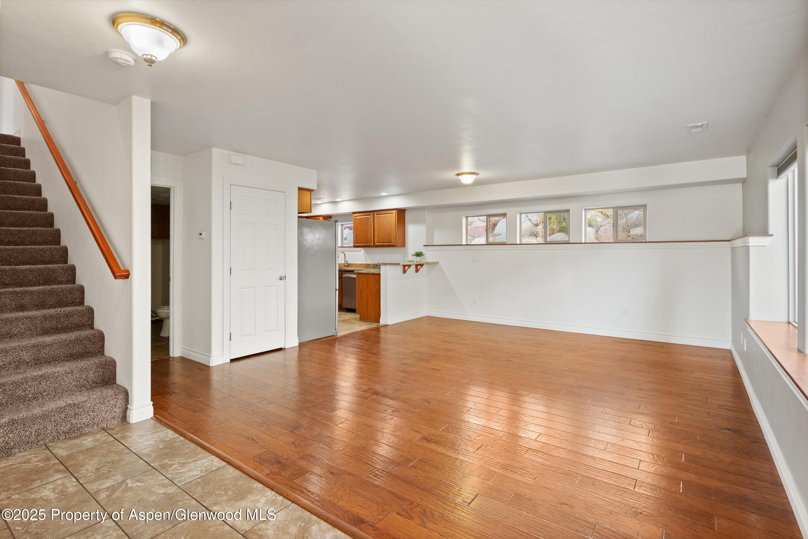 200 Castle Ridge Drive New Castle, CO 81647 - Photo 8 of 24 a view of empty room with wooden floor