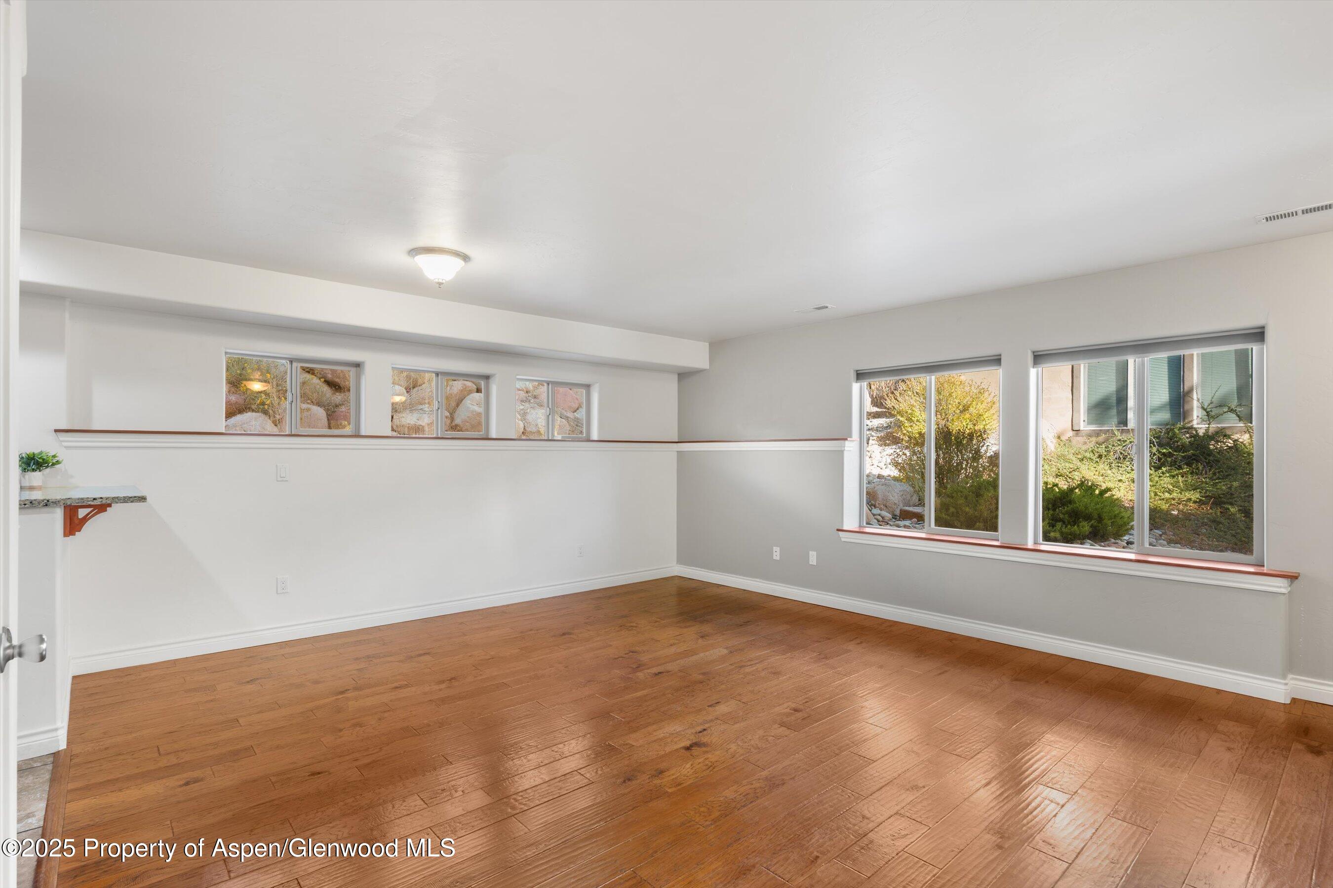 200 Castle Ridge Drive New Castle, CO 81647 - Photo 9 of 24 an empty room with windows