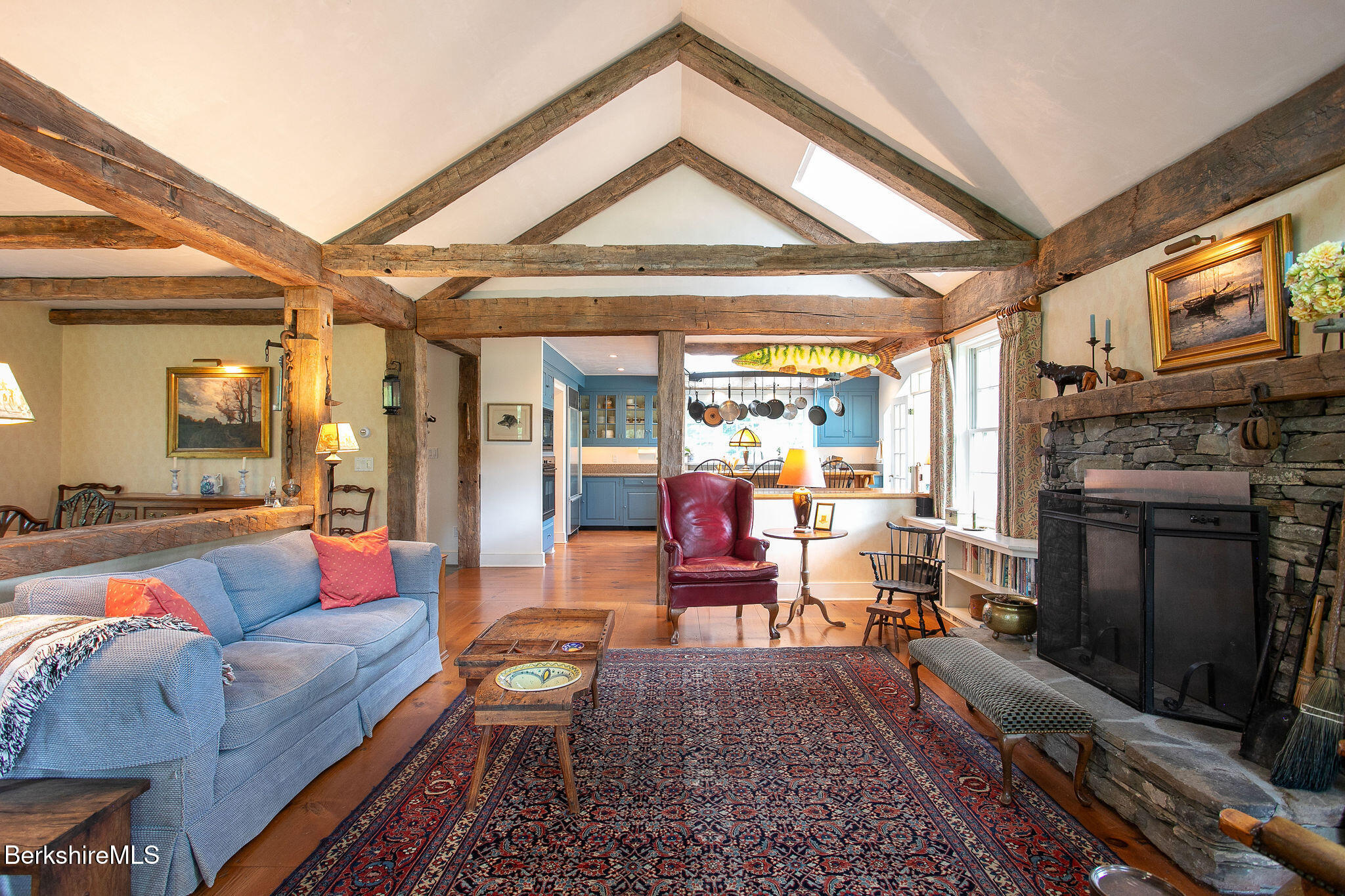 Undisclosed Address West Stockbridge, MA 01236 - Photo 19 of 61 a living room with furniture a fireplace and a flat screen tv