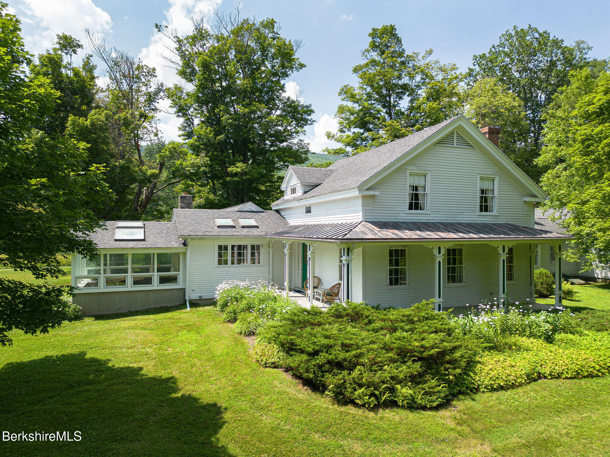 Undisclosed Address West Stockbridge, MA 01236 - Photo 3 of 61 a front view of a house with a yard