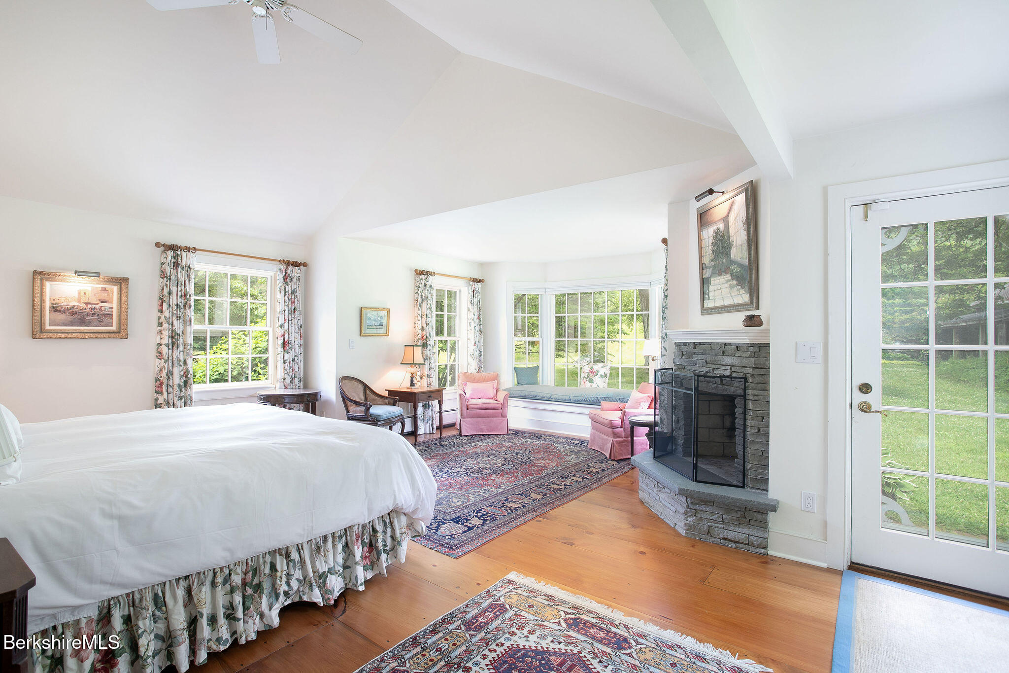 Undisclosed Address West Stockbridge, MA 01236 - Photo 31 of 61 a spacious bedroom with a bed and a fireplace