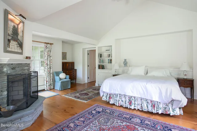 a white toilet sitting next to a bathroom sink