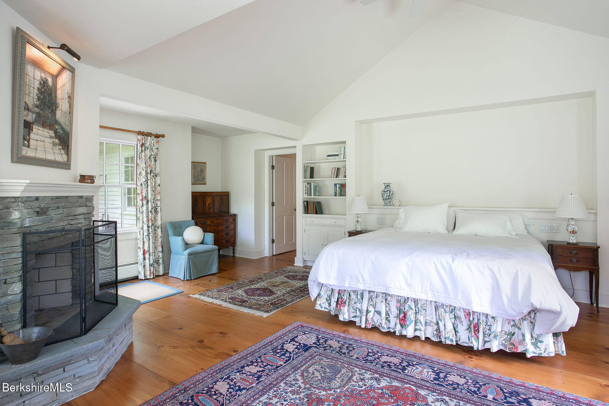 Undisclosed Address West Stockbridge, MA 01236 - Photo 32 of 61 a bedroom with a bed and a fireplace