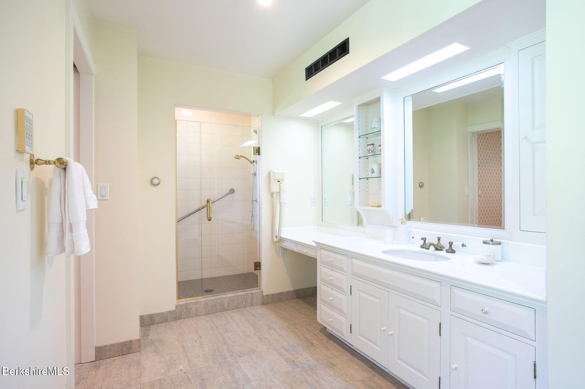 Undisclosed Address West Stockbridge, MA 01236 - Photo 38 of 61 a spacious bathroom with a shower sink and mirror