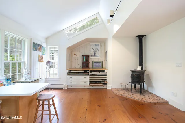 a bedroom with bed and a couch