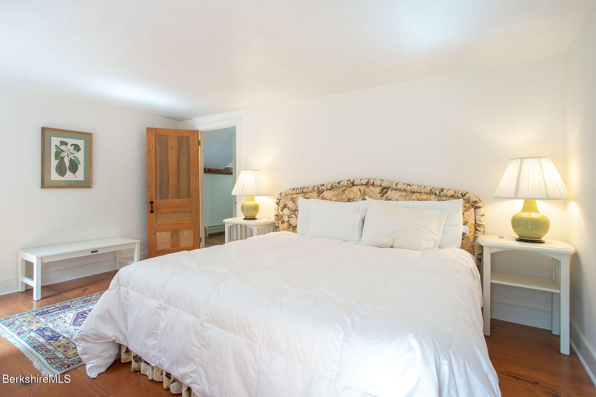 Undisclosed Address West Stockbridge, MA 01236 - Photo 47 of 61 a bedroom with a bed and a lamp with window