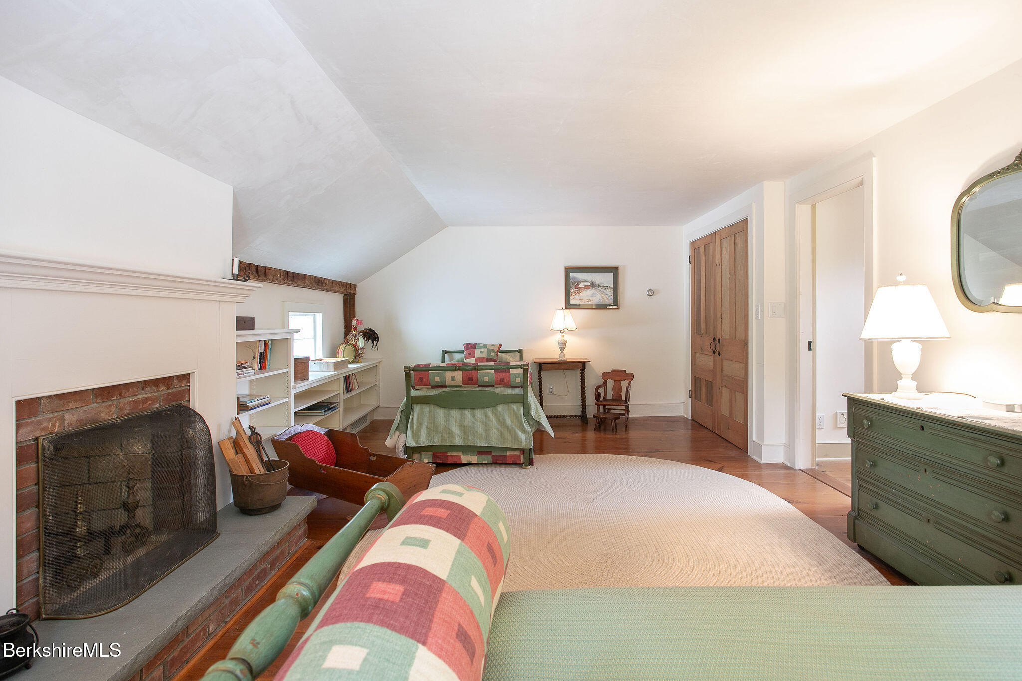 Undisclosed Address West Stockbridge, MA 01236 - Photo 51 of 61 a bedroom with bed and a fireplace