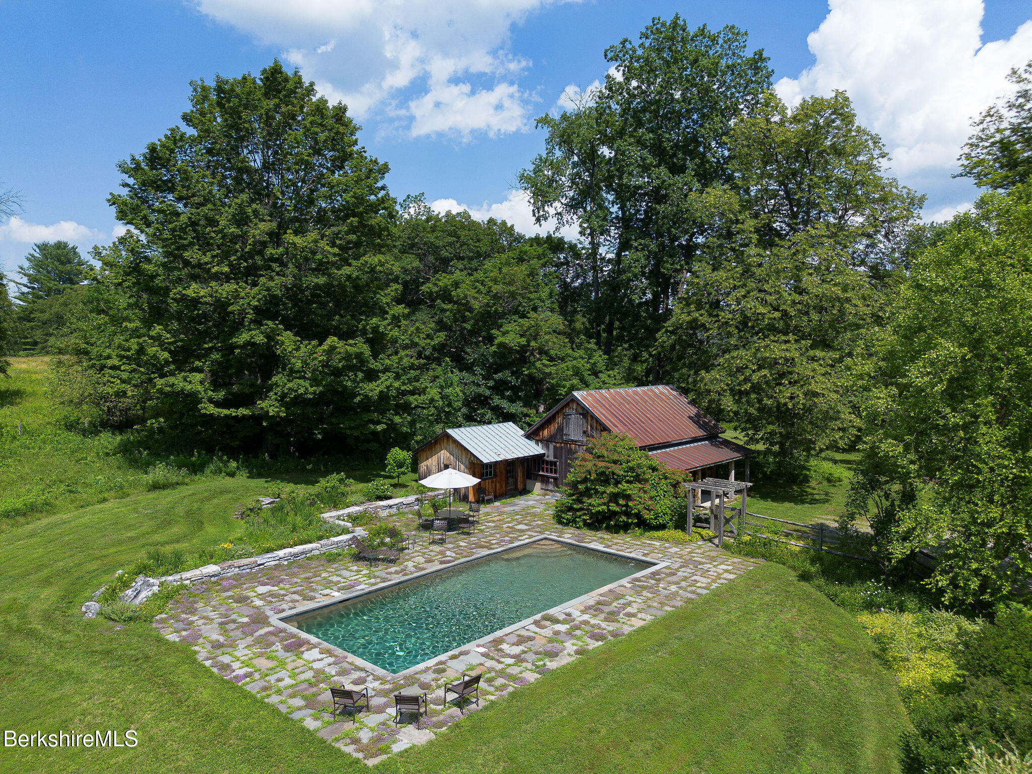 Undisclosed Address West Stockbridge, MA 01236 - Photo 6 of 61 a view of a garden with lawn chairs