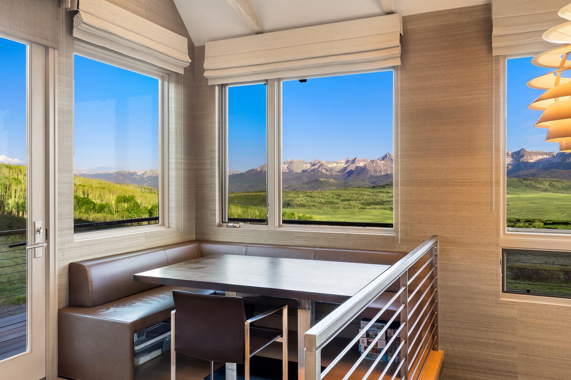 3362 Ranch Road Ridgway, CO 81432 - Photo 15 of 40 a dining room with furniture and window