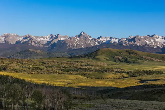 a view of a lake with a mountain