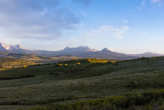 a view of mountain with lake view