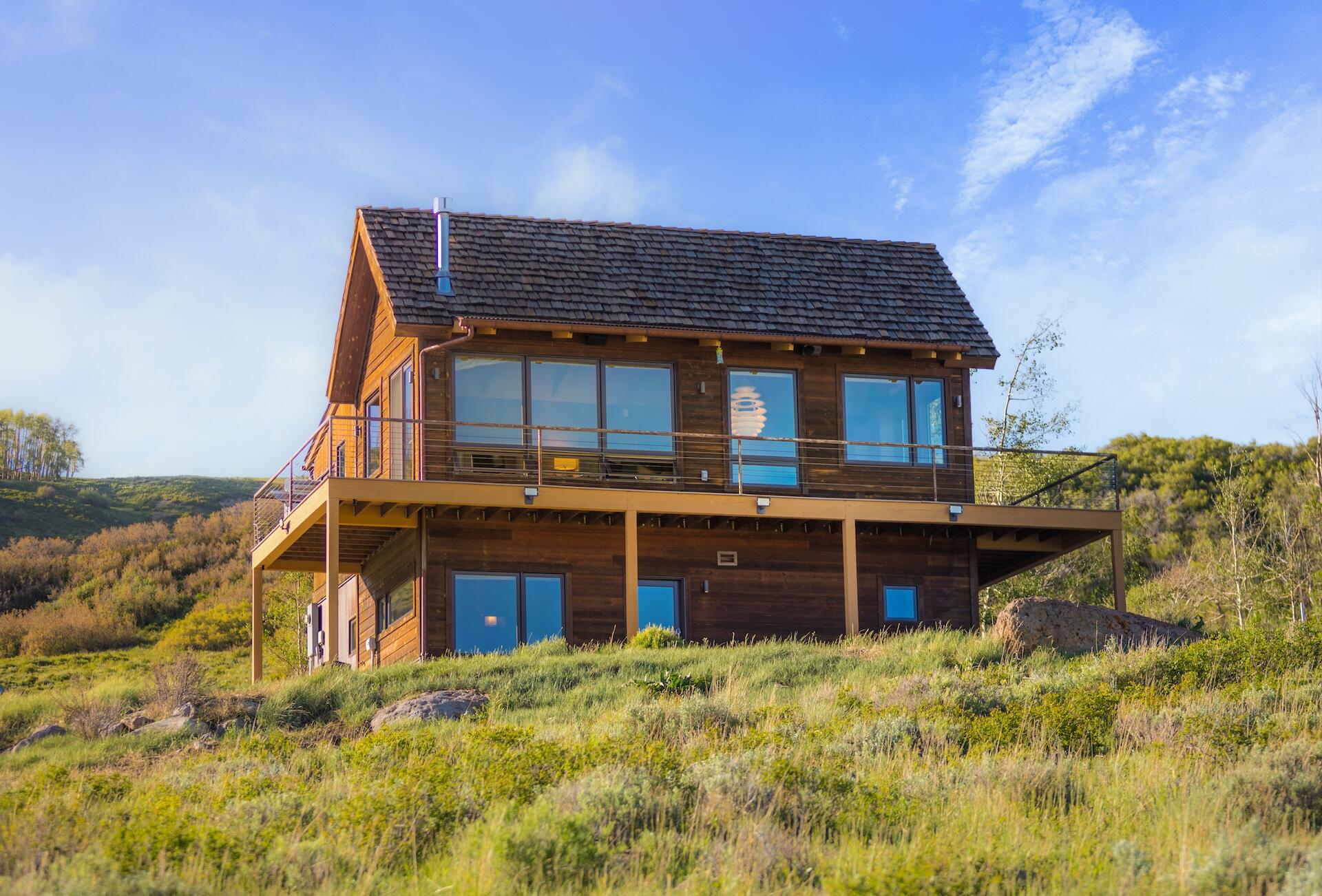 3362 Ranch Road Ridgway, CO 81432 - Photo 4 of 40 front view of a house with a yard