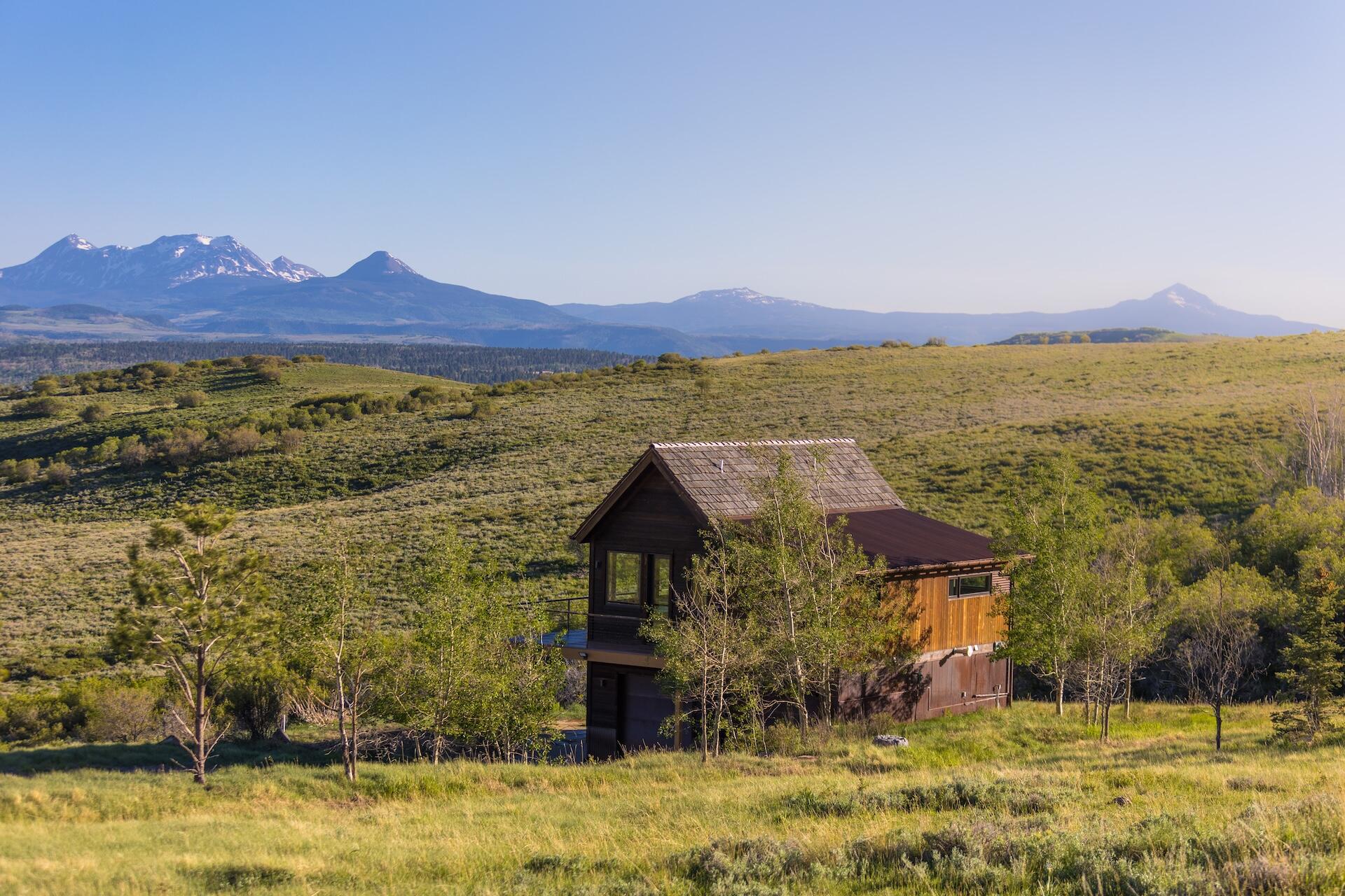 3362 Ranch Road Ridgway, CO 81432 - Photo 5 of 40 a view of a house with a yard