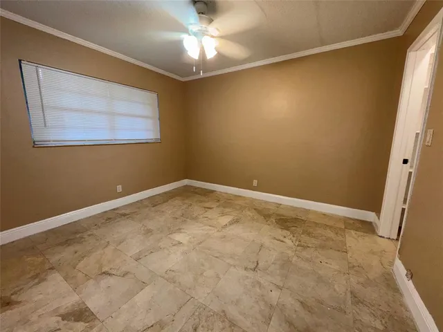 a view of empty room with a window