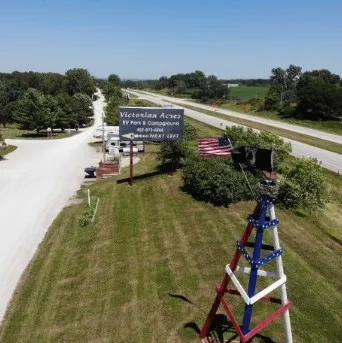 a view of a swimming pool with a yard and lake view