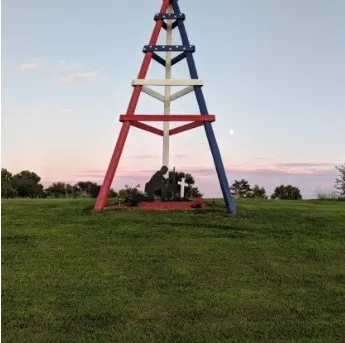 a view of a house with car parked