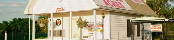 a view of a street with a building in the background