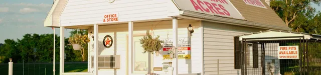 a view of a street with a building in the background