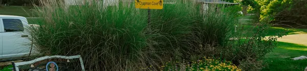 a sign board on the side of a road