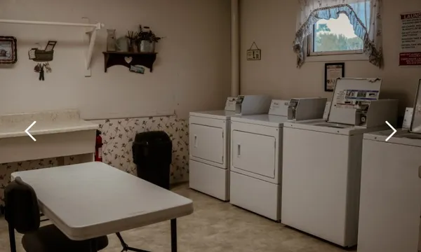 a view of a bathroom with a sink and a shower