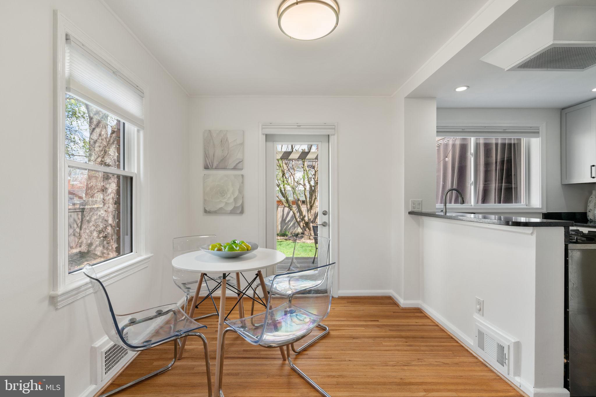 6021 Williamsburg Road Alexandria, VA 22303 - Photo 11 of 44 a view of a dining room with furniture and a window