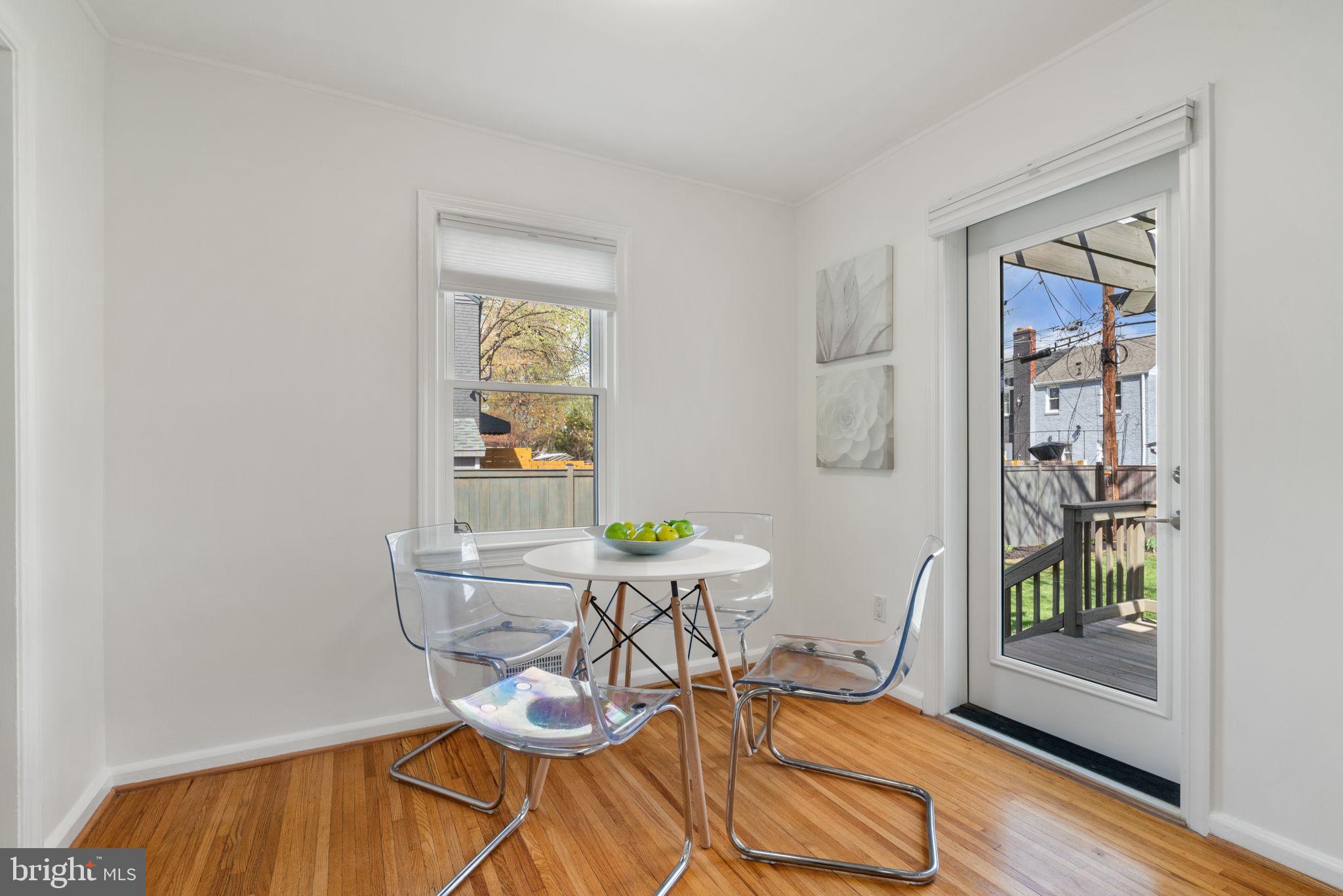6021 Williamsburg Road Alexandria, VA 22303 - Photo 12 of 44 a view of a dining room with furniture and a window