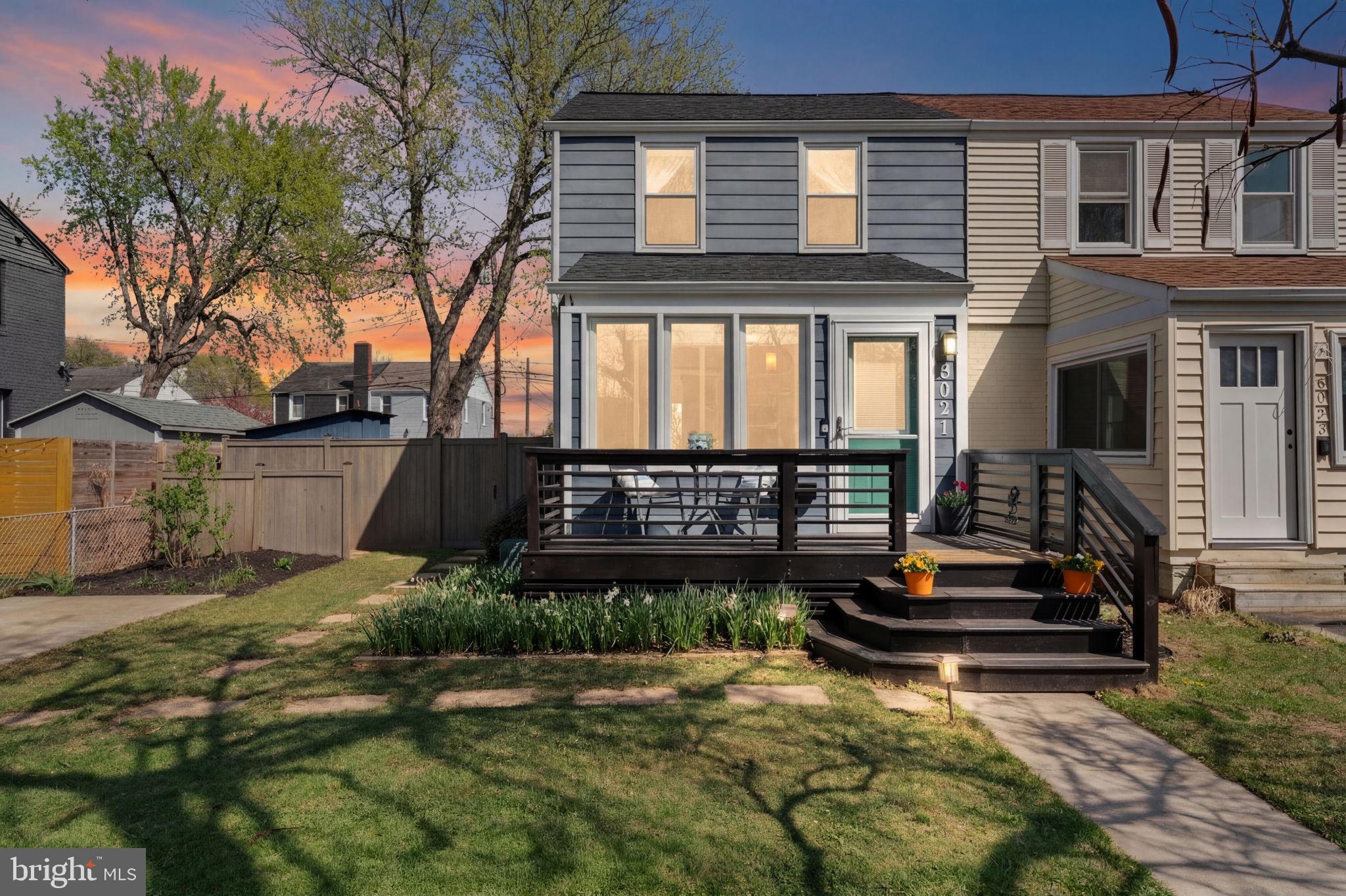 6021 Williamsburg Road Alexandria, VA 22303 - Photo 2 of 44 a backyard of a house with barbeque oven and outdoor seating