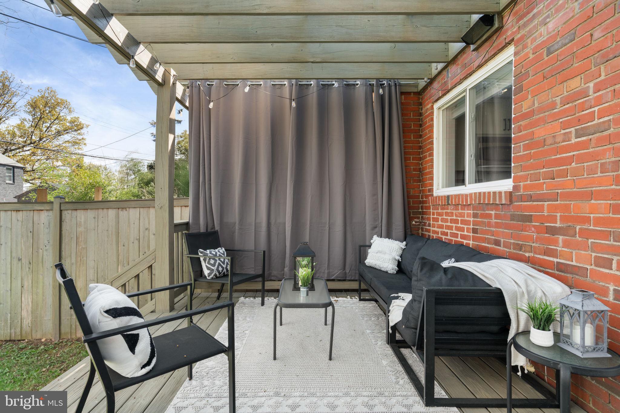 6021 Williamsburg Road Alexandria, VA 22303 - Photo 32 of 44 a view of patio with a table and chairs