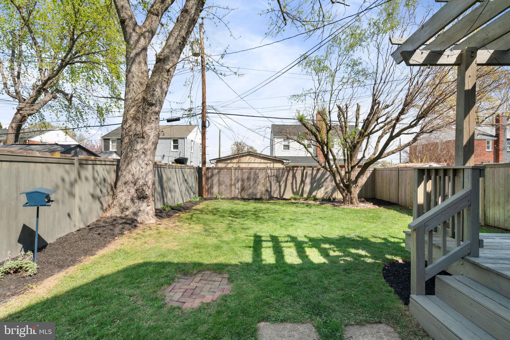 6021 Williamsburg Road Alexandria, VA 22303 - Photo 35 of 44 front view of a house with a yard