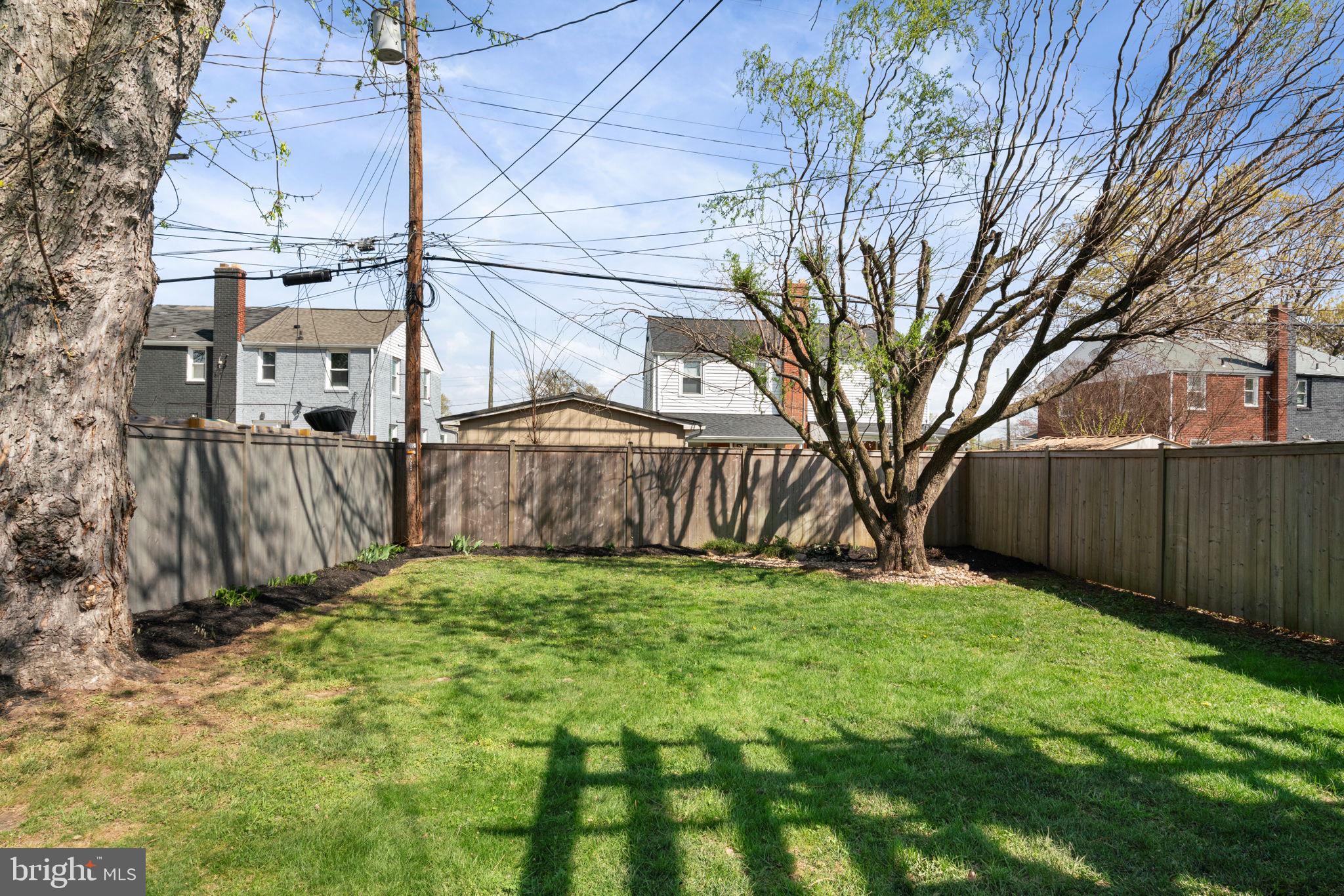 6021 Williamsburg Road Alexandria, VA 22303 - Photo 36 of 44 a view of a back yard of the house