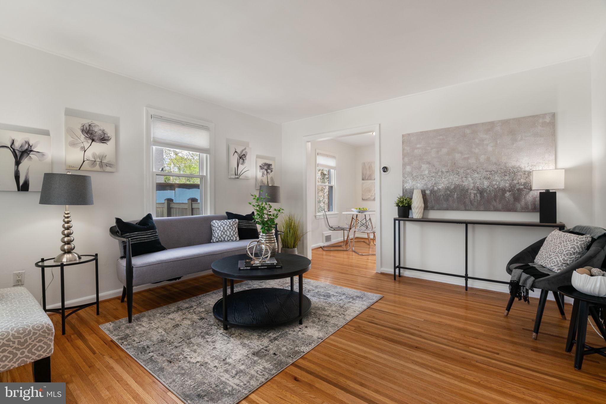 6021 Williamsburg Road Alexandria, VA 22303 - Photo 8 of 44 a living room with furniture and a rug