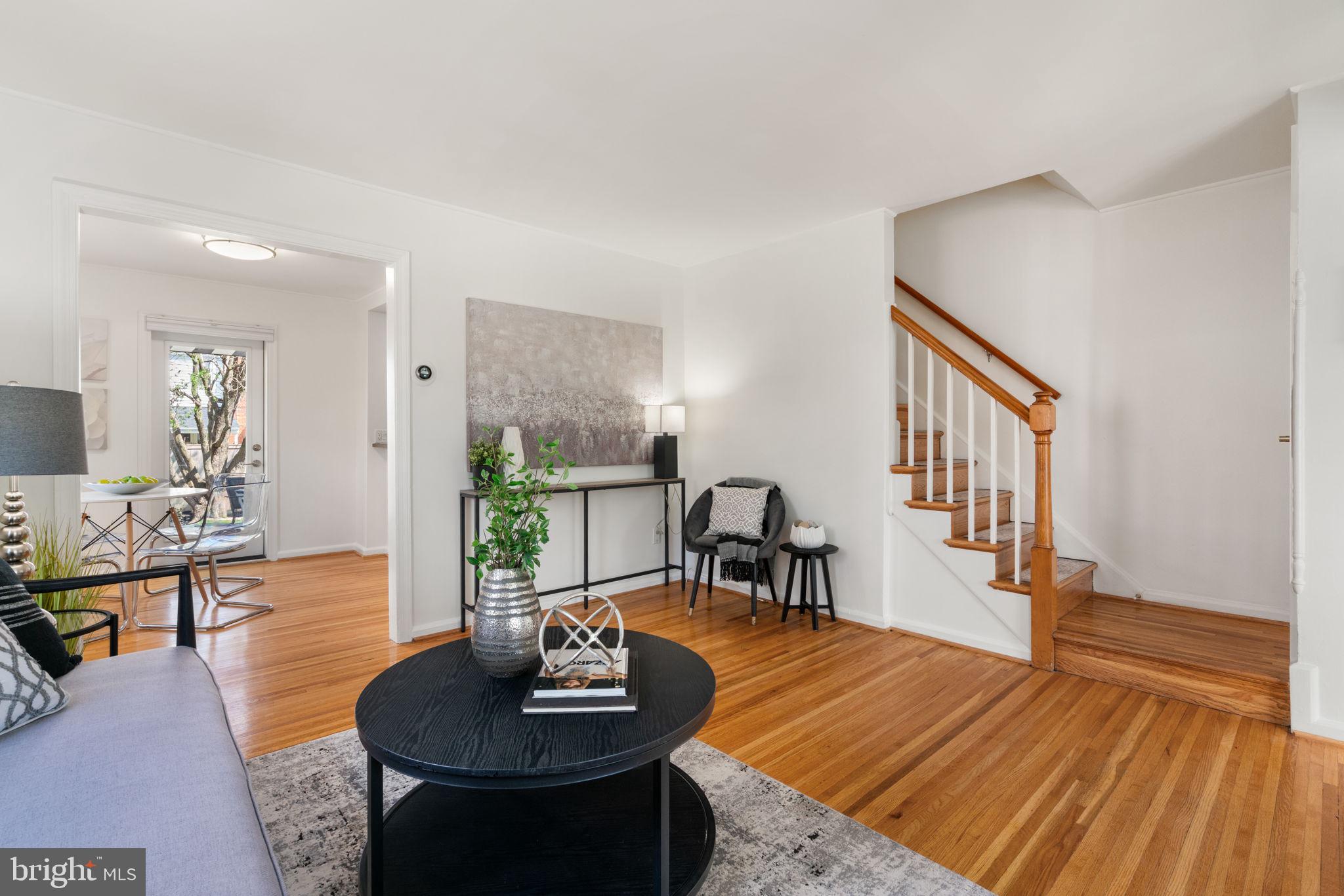 6021 Williamsburg Road Alexandria, VA 22303 - Photo 10 of 44 a living room with furniture and a wooden floor