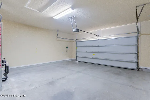 a view of a park with swings and slides