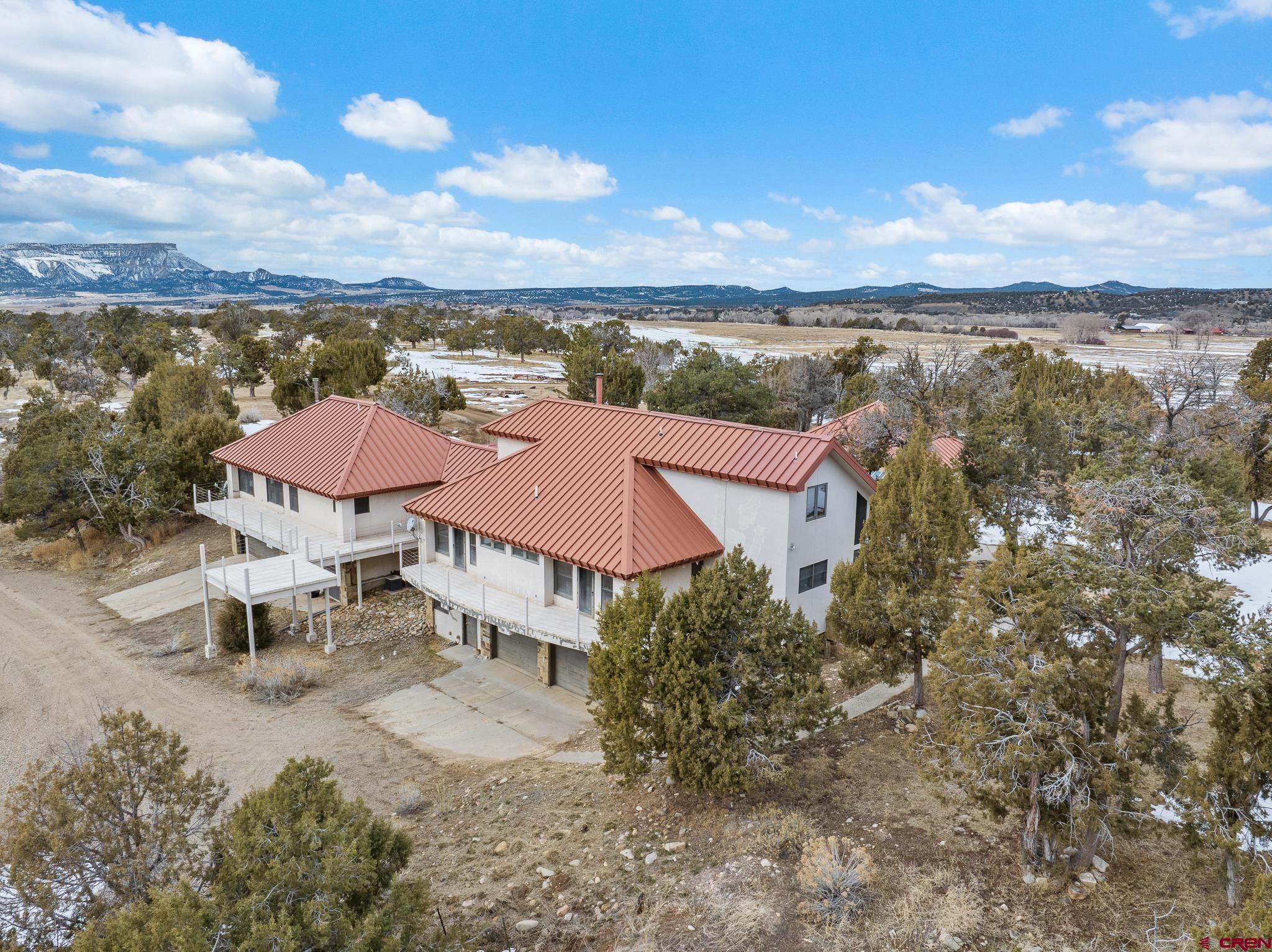 40926 Rd J Mancos, CO 81328 - Photo 18 of 24 a view of a terrace with lawn chairs