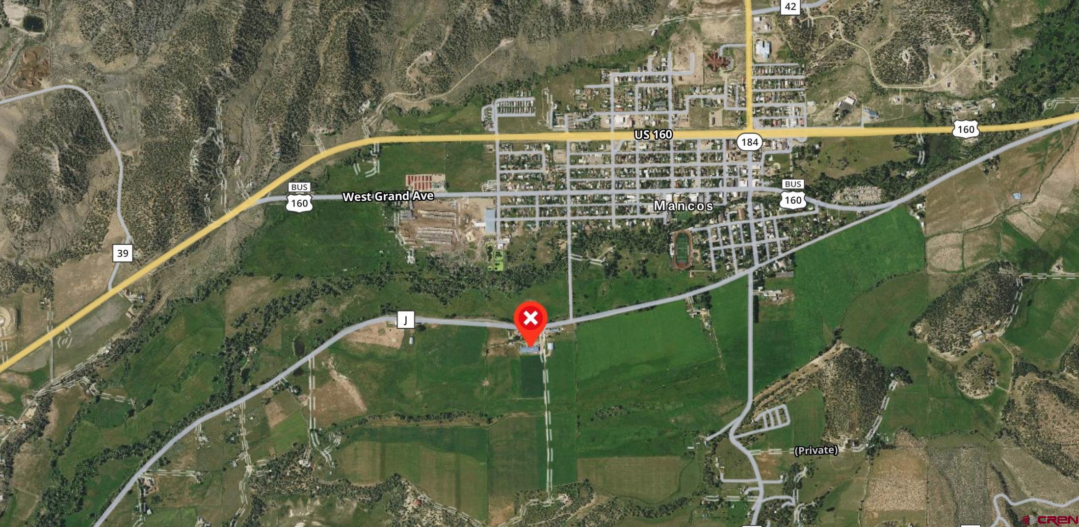 40926 Rd J Mancos, CO 81328 - Photo 9 of 24 a close up of a yard