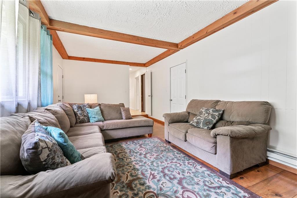 154 Central Road Tarrs, PA 15688 - Photo 12 of 24 a living room with furniture and a couch