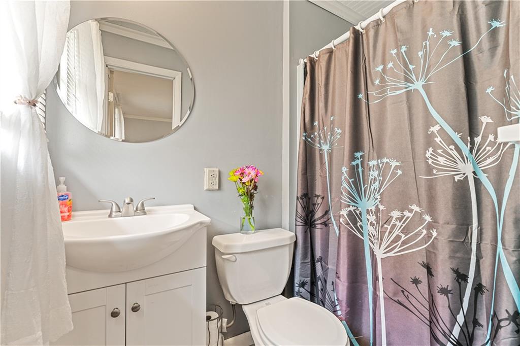 154 Central Road Tarrs, PA 15688 - Photo 16 of 24 a bathroom with a toilet sink and mirror