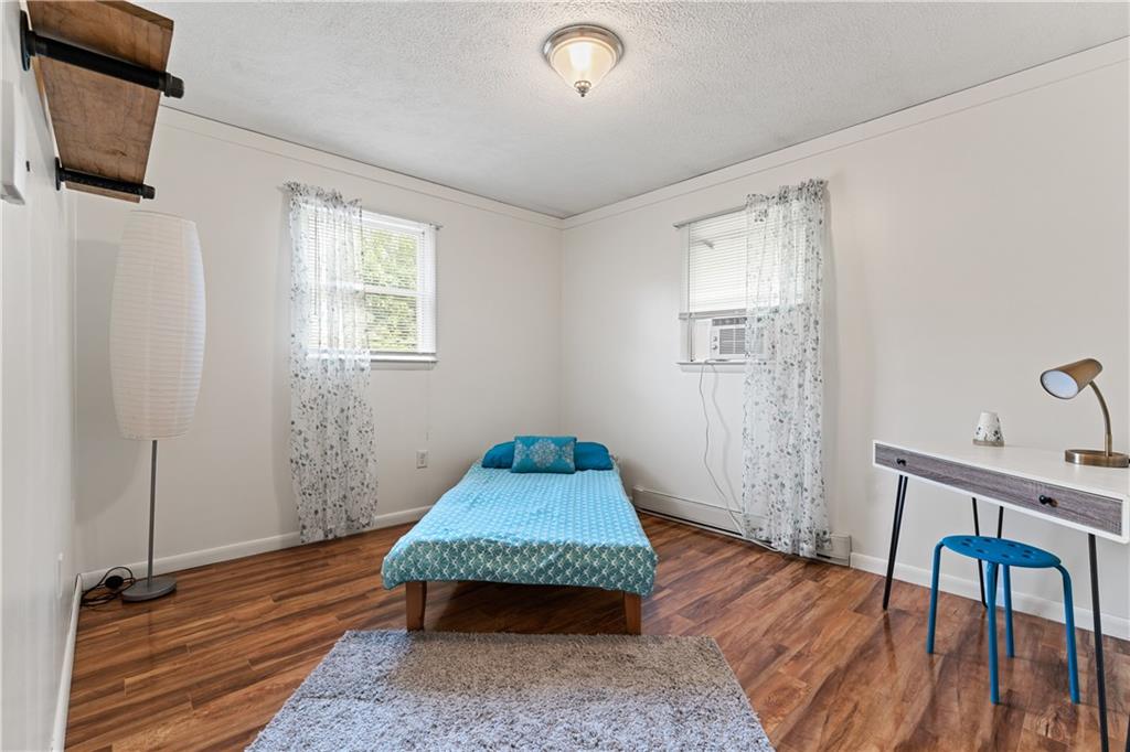 154 Central Road Tarrs, PA 15688 - Photo 18 of 24 a bedroom with a bed and a table in it