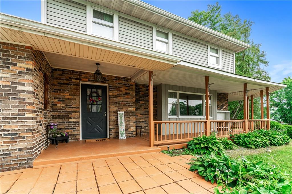 154 Central Road Tarrs, PA 15688 - Photo 2 of 24 front view of a house with a porch