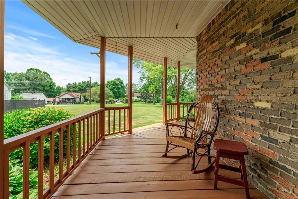 154 Central Road Tarrs, PA 15688 - Photo 3 of 24 a view of a two chairs in the balcony